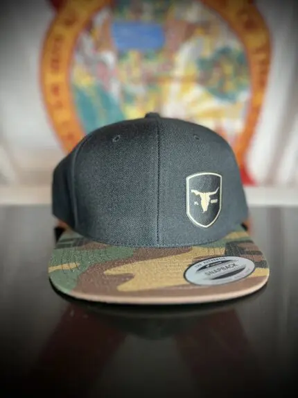 Classic Black w/Retro Camo Flat Bill with small gold and black patch